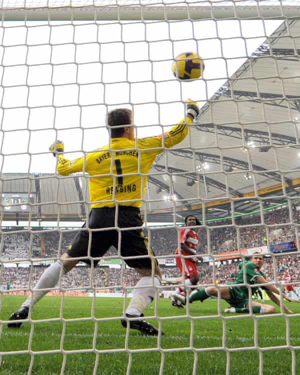 Edin Dzeko scores past Bayern keeper Michael Rensing in April 2009.
